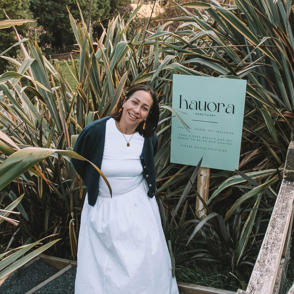 Laura with a retreat sign